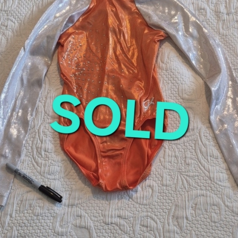 GK child Large orange & white shimmery leotard, dance gymnastics, GUC arm holes
